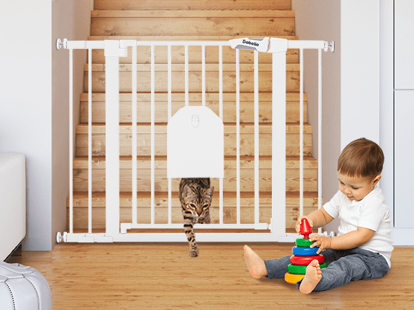 Babelio baby safety gate with pet door installed by stairs in living area, cat and toddler present