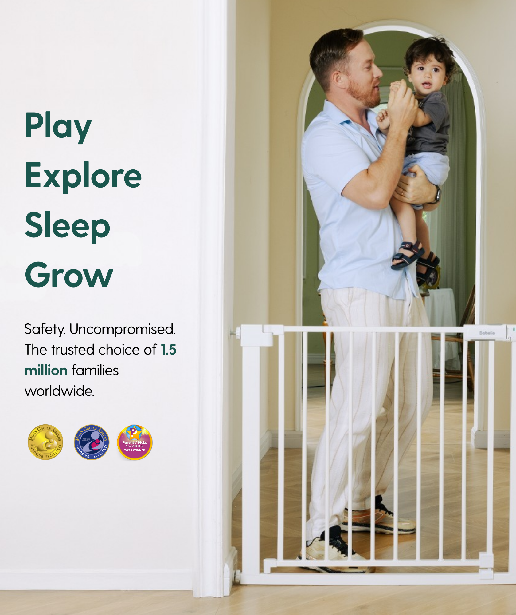 Man holding a child next to a baby gate with safety certification logos on a white background.