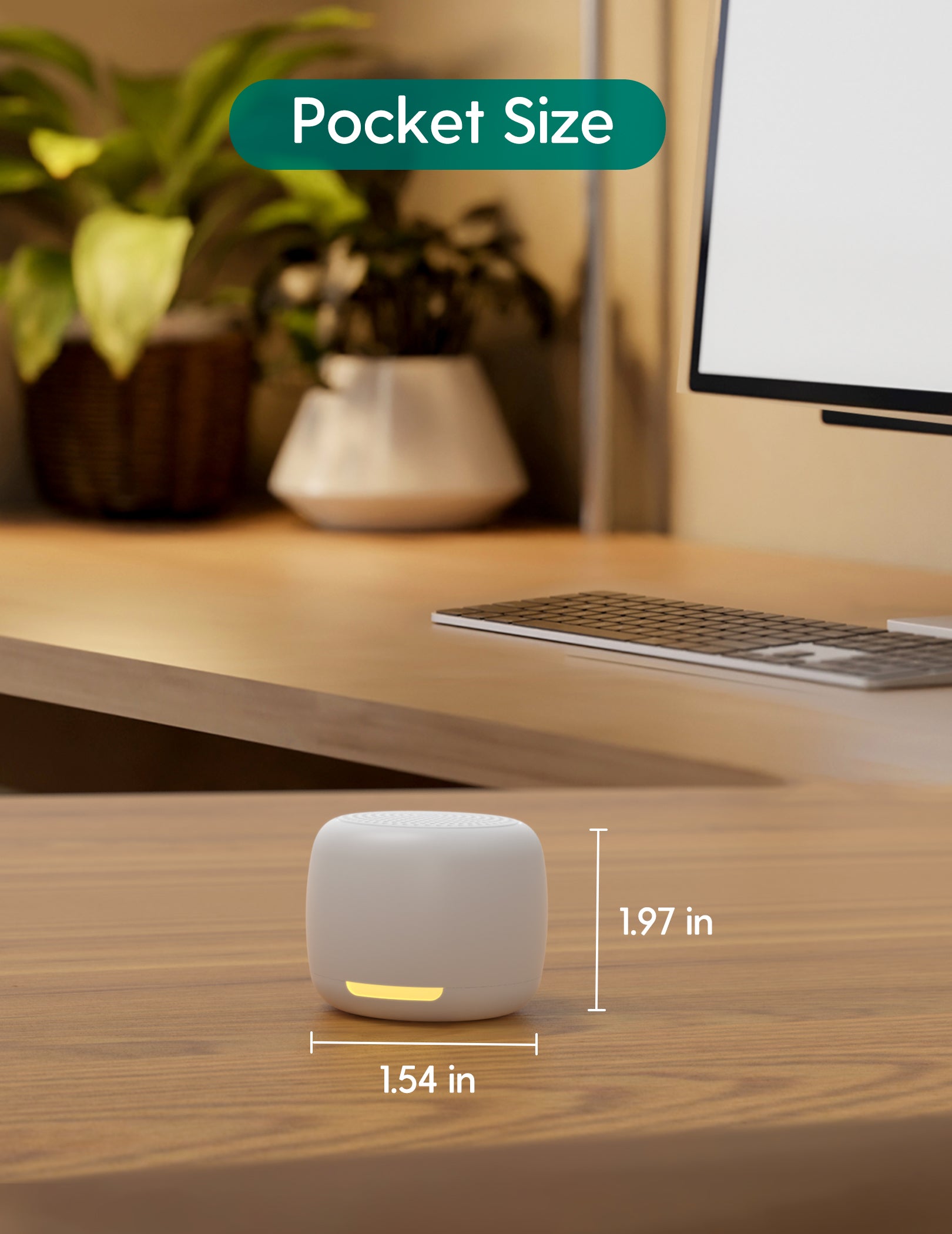 Compact white noise machine on a desk, pocket size with 1.97 inch height and 1.54 inch width