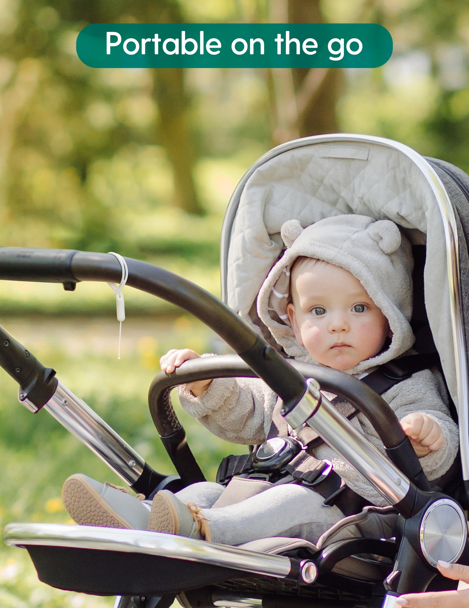 Baby in a stroller with 'Portable on the go' text