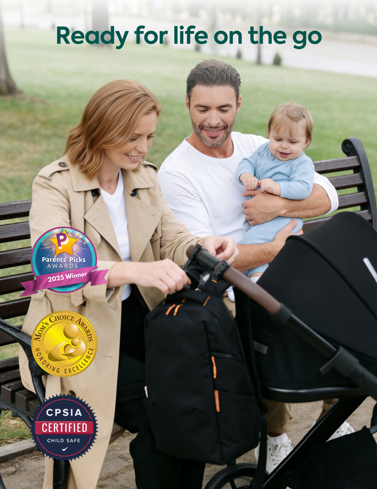 Family with a stroller in a park, with awards displayed on the screen.
#Color_Black