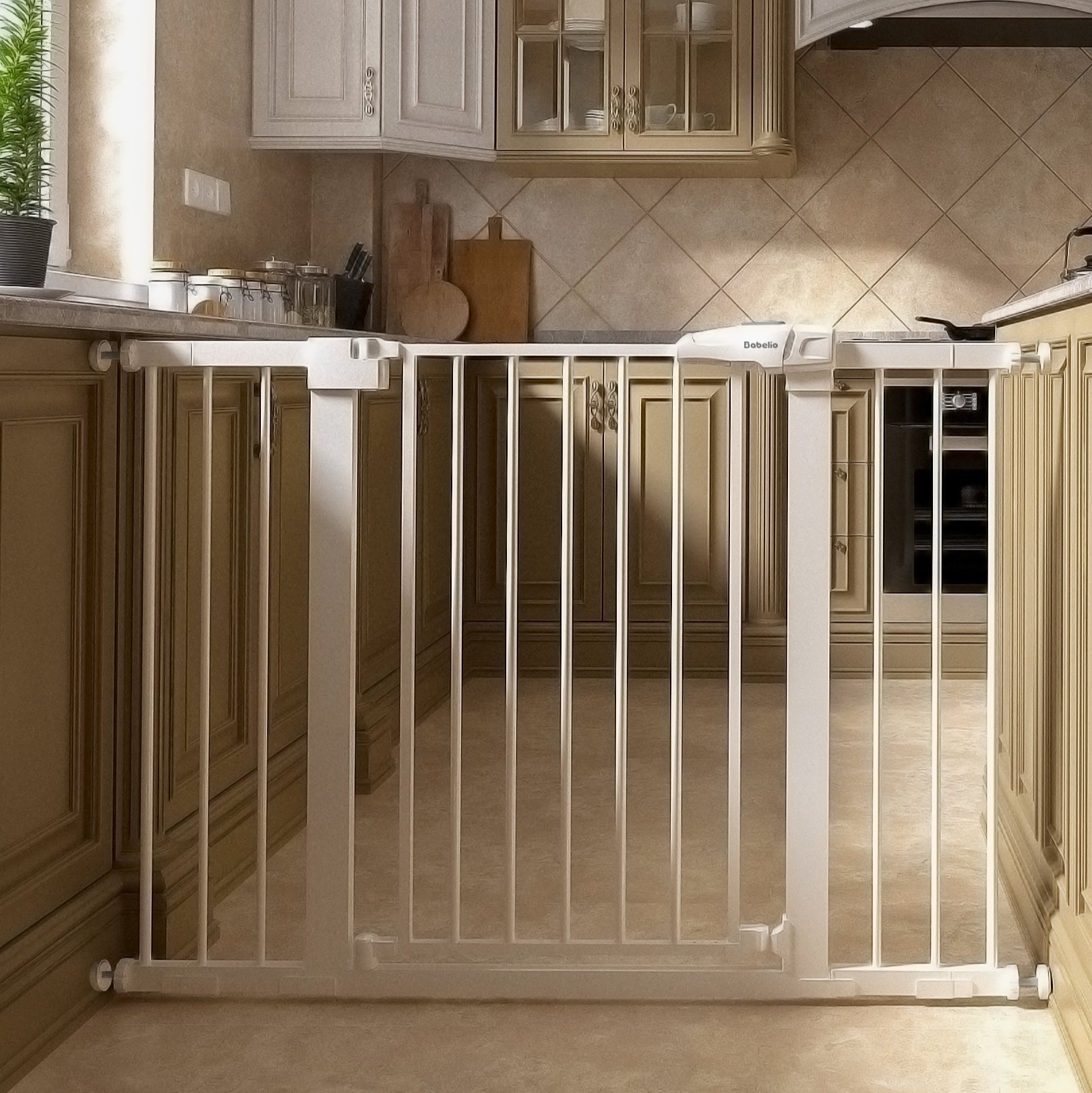 Kitchen with a metal safety gate installed to prevent pets from entering.