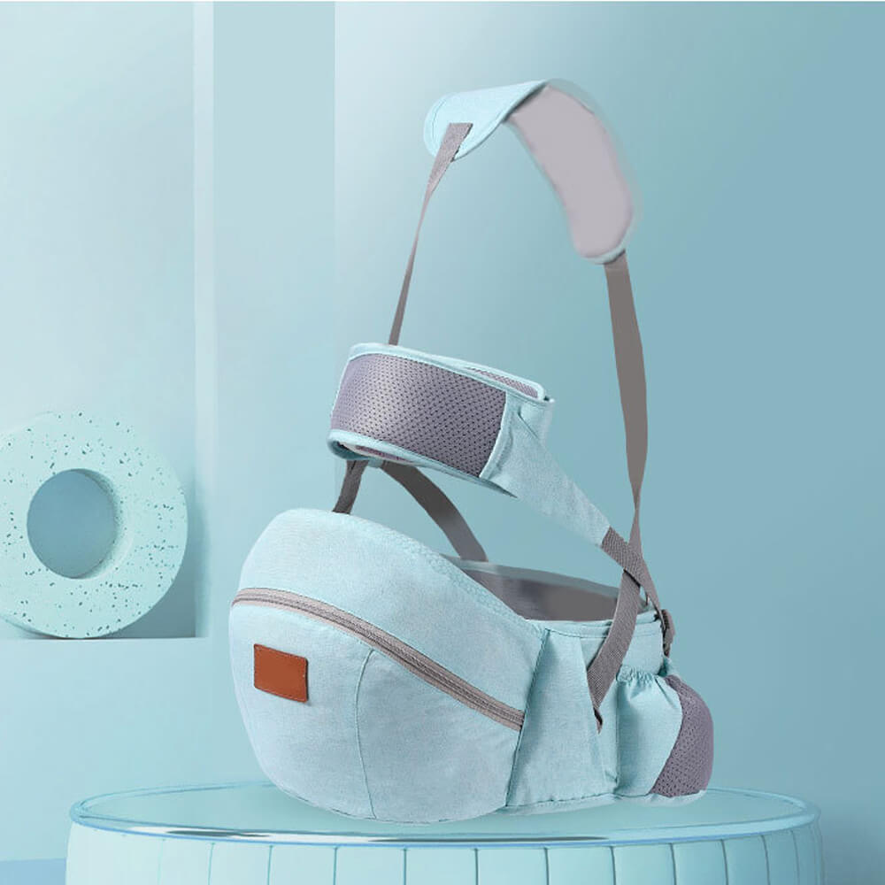 Babelio light blue baby waist stool and carrier with storage pocket in a modern nursery