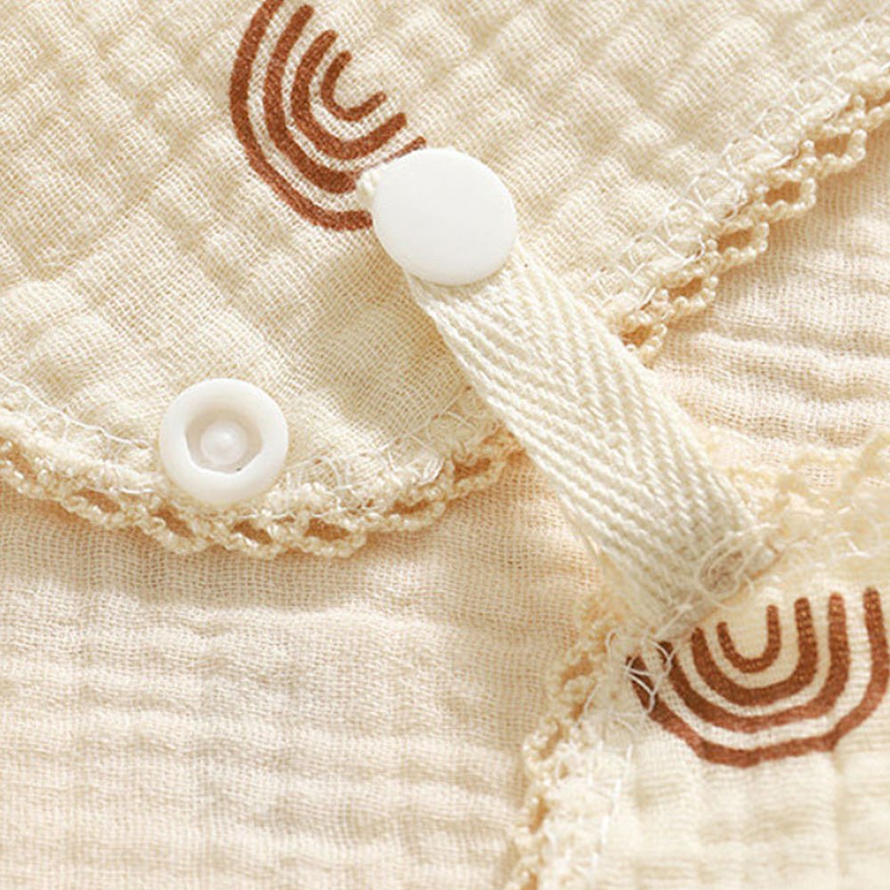 Babelio 4-layer cotton muslin baby bib with snap closure and rainbow pattern detail