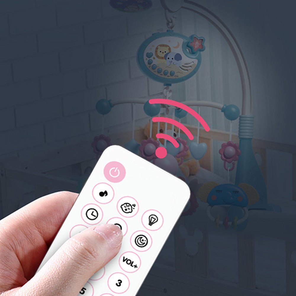 Babelio remote-controlled white noise machine on nursery crib with hanging mobile