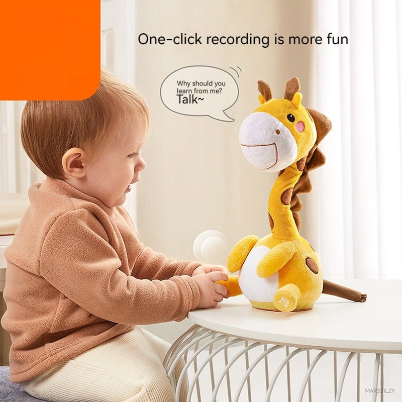 Babelio baby playing with plush giraffe toy at a table in a bright nursery