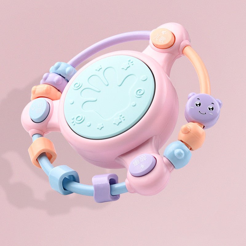 Babelio pastel baby rattle toy with cute animal face, shown in a nursery setting