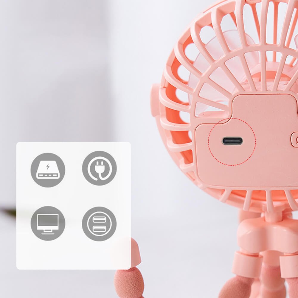 Babelio portable USB rechargeable stroller fan in pink, shown close-up indoors.