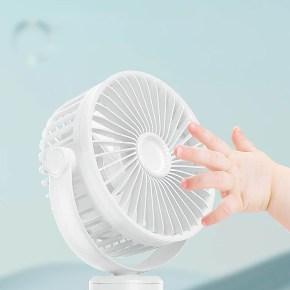 Babelio white portable USB fan with baby hand in nursery setting