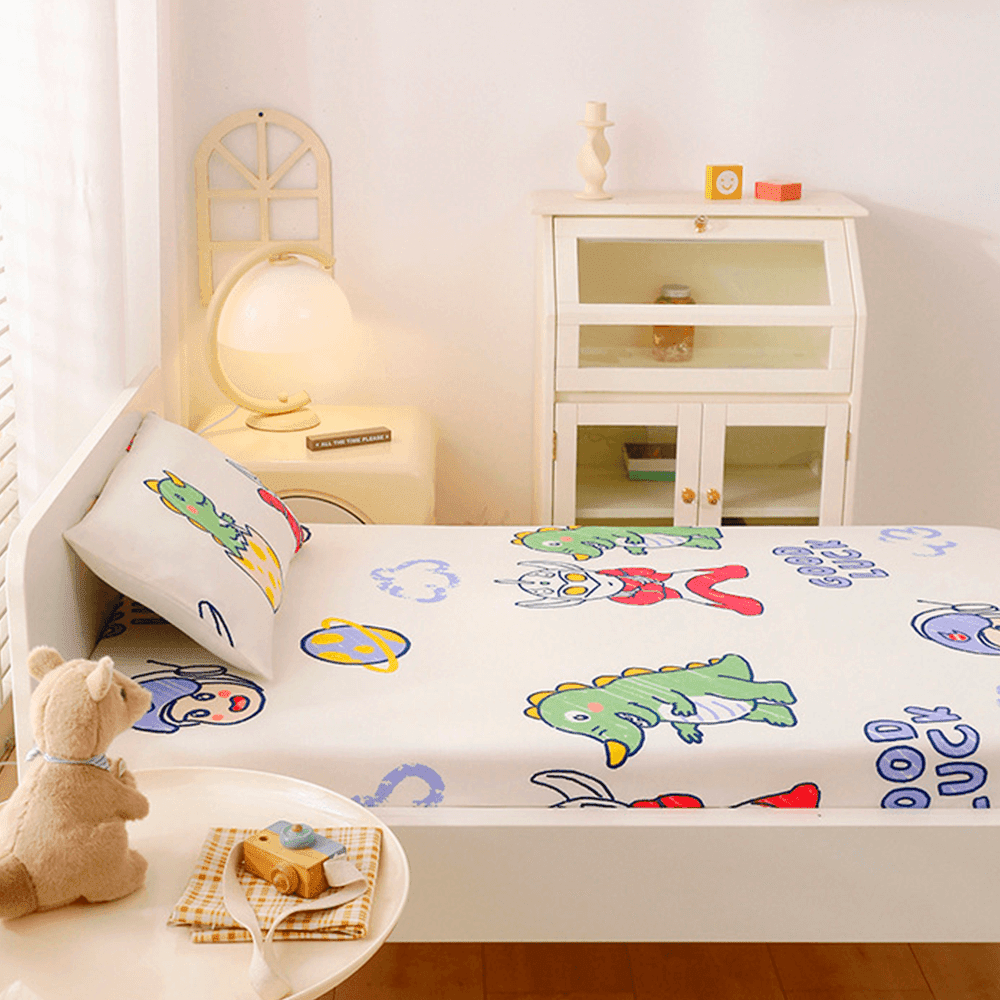 Babelio crib mattress with playful cartoon pattern in a cozy nursery setting