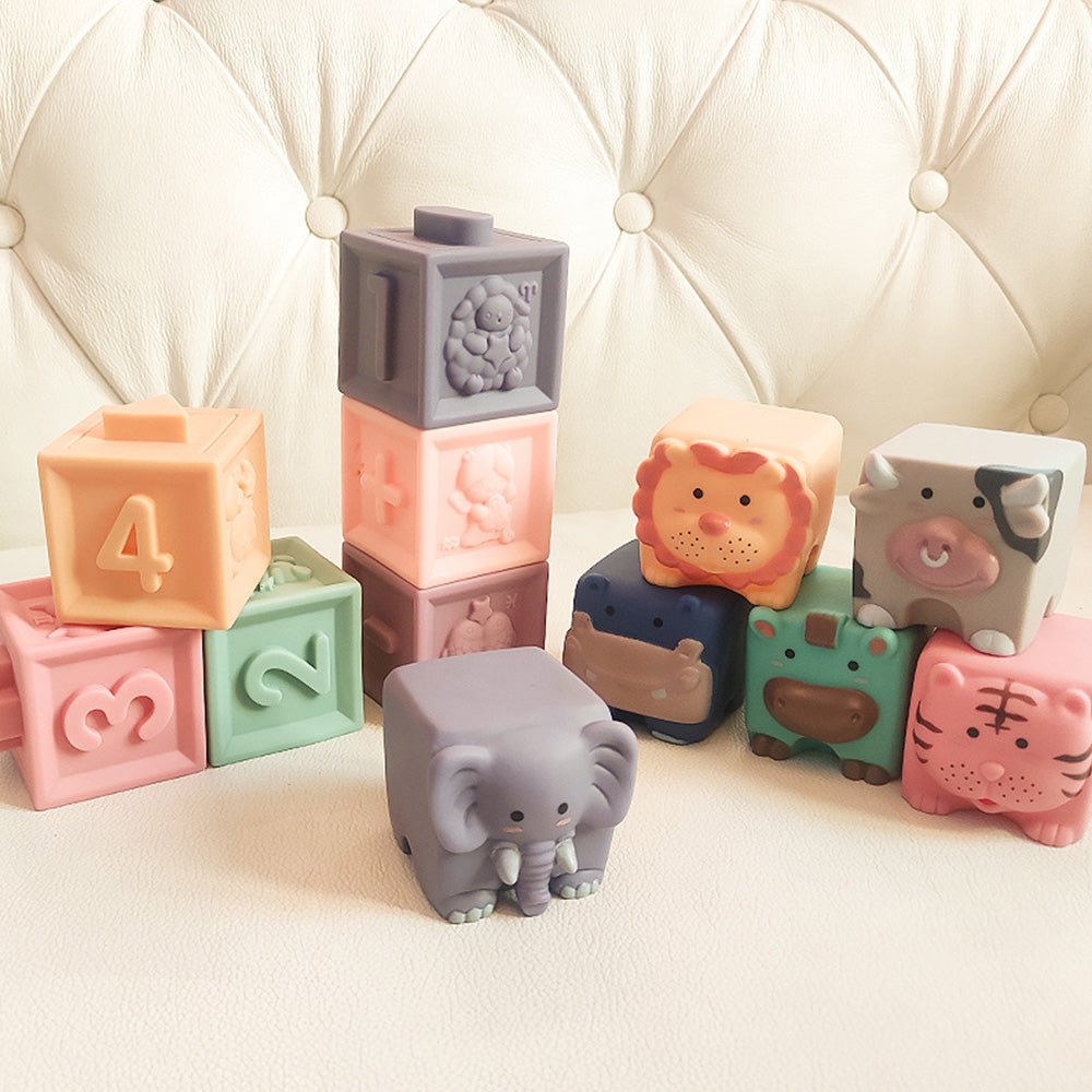Babelio soft animal and number baby blocks on a nursery couch