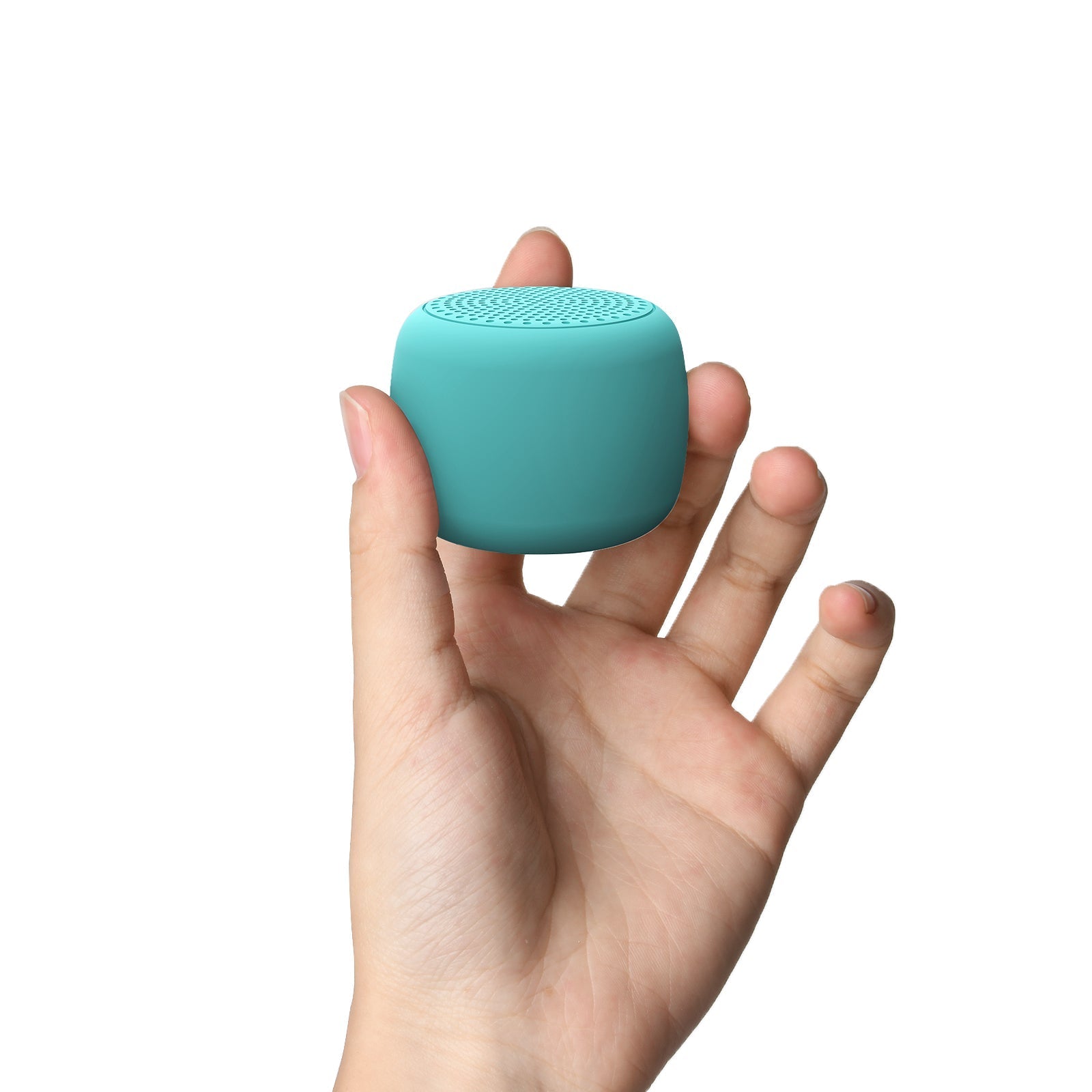 Hand holding Babelio mini white noise machine, compact sound device for travel or nursery