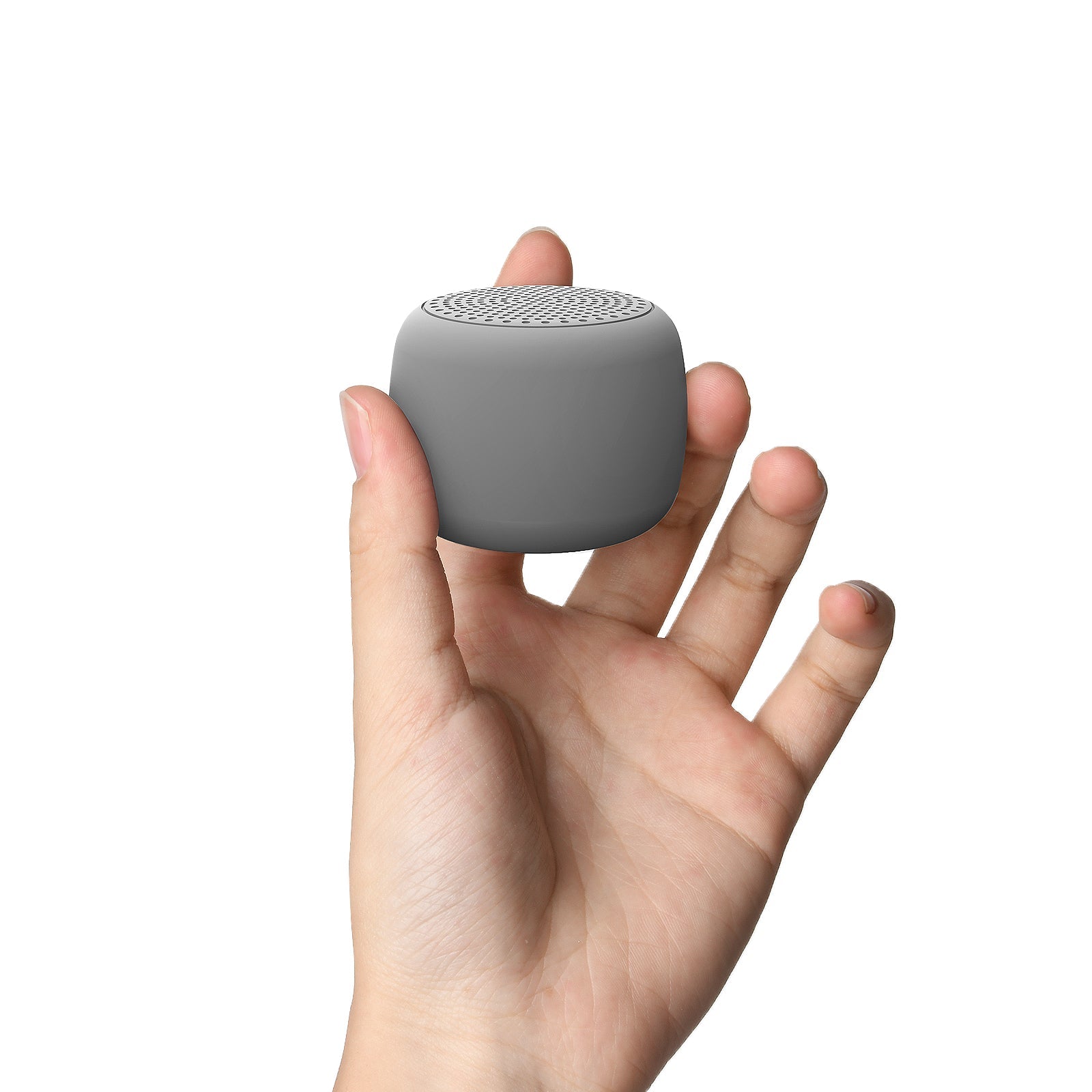Hand holding Babelio mini white noise machine, compact sound device for travel or nursery