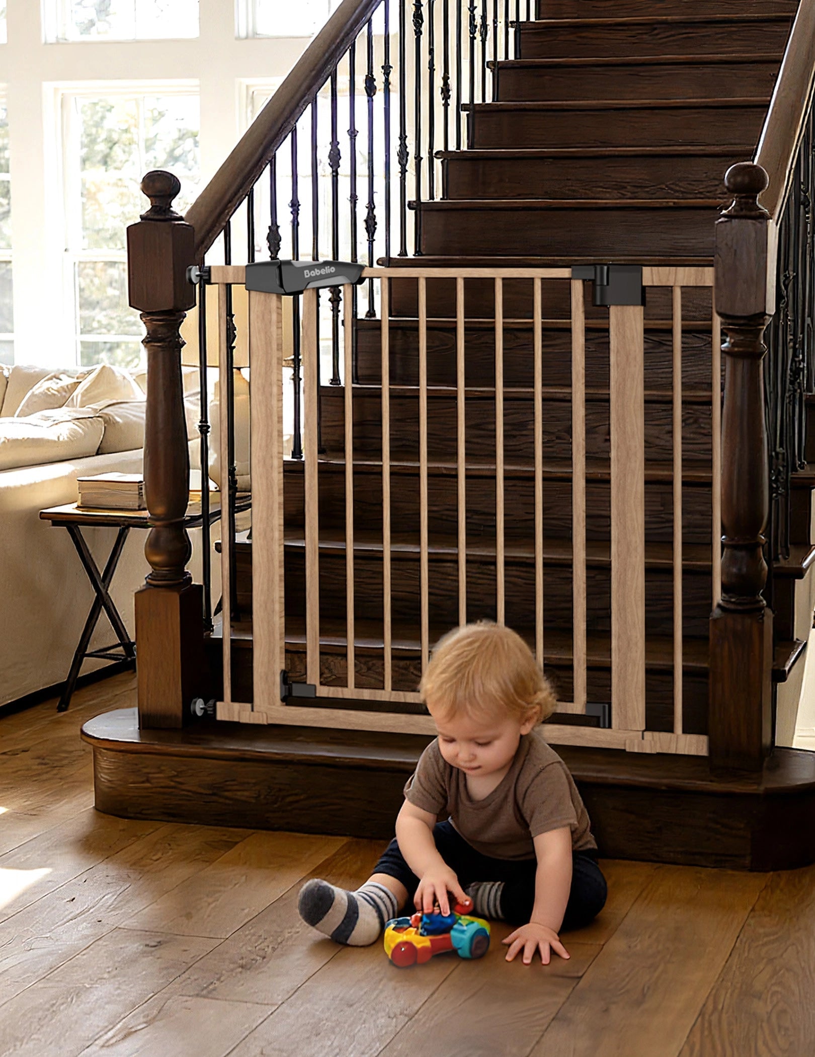 Babelio baby safety gate with wood pattern on stairs in living room, toddler playing nearby. #Color_Wood Pattern