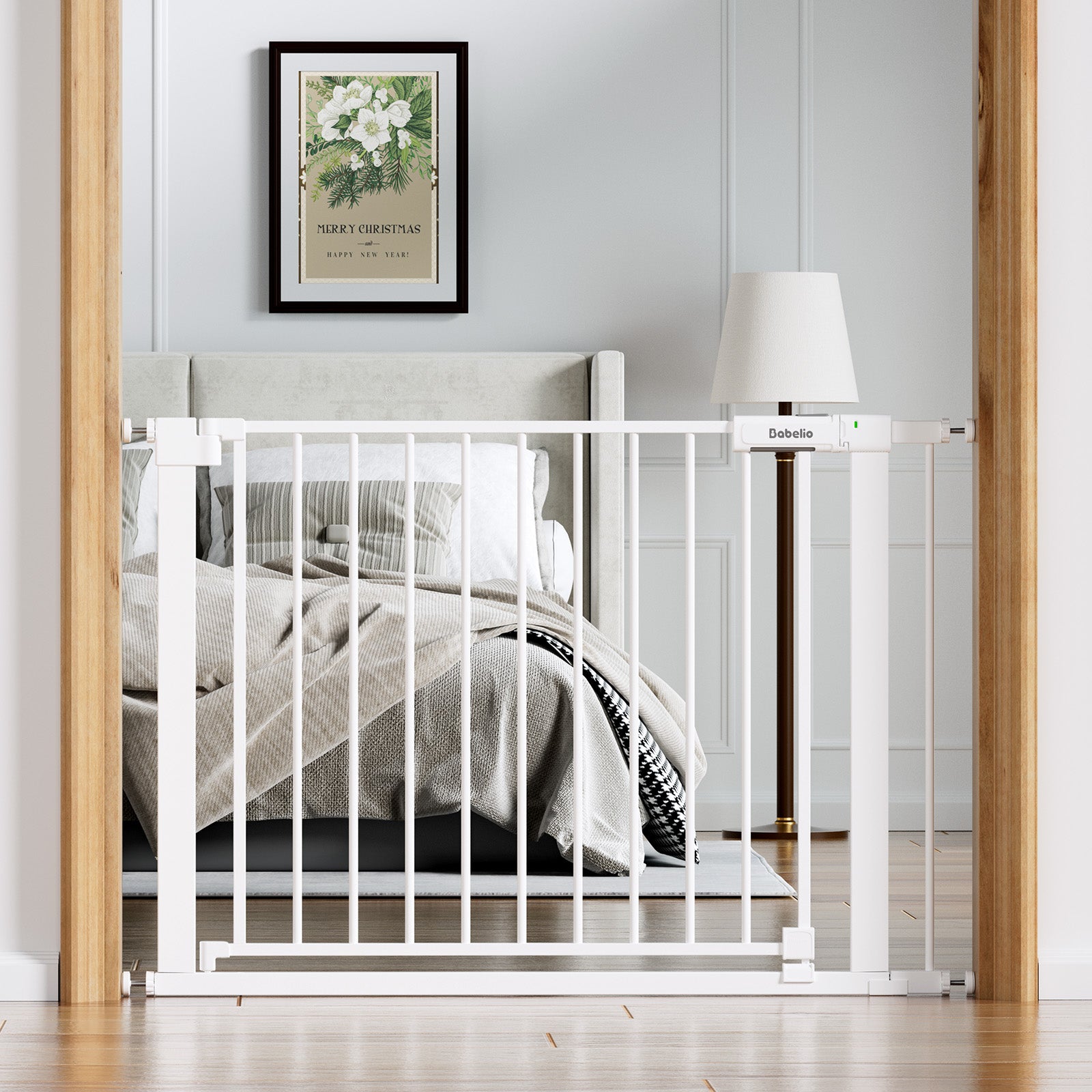 White baby gate in a bedroom setting with a bed and lamp in the background.#Color_White