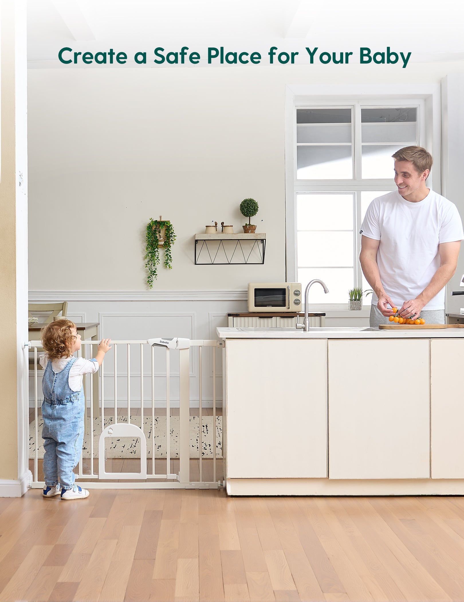 Child standing next to a safety gate in a kitchen with a man preparing food.#Color_White