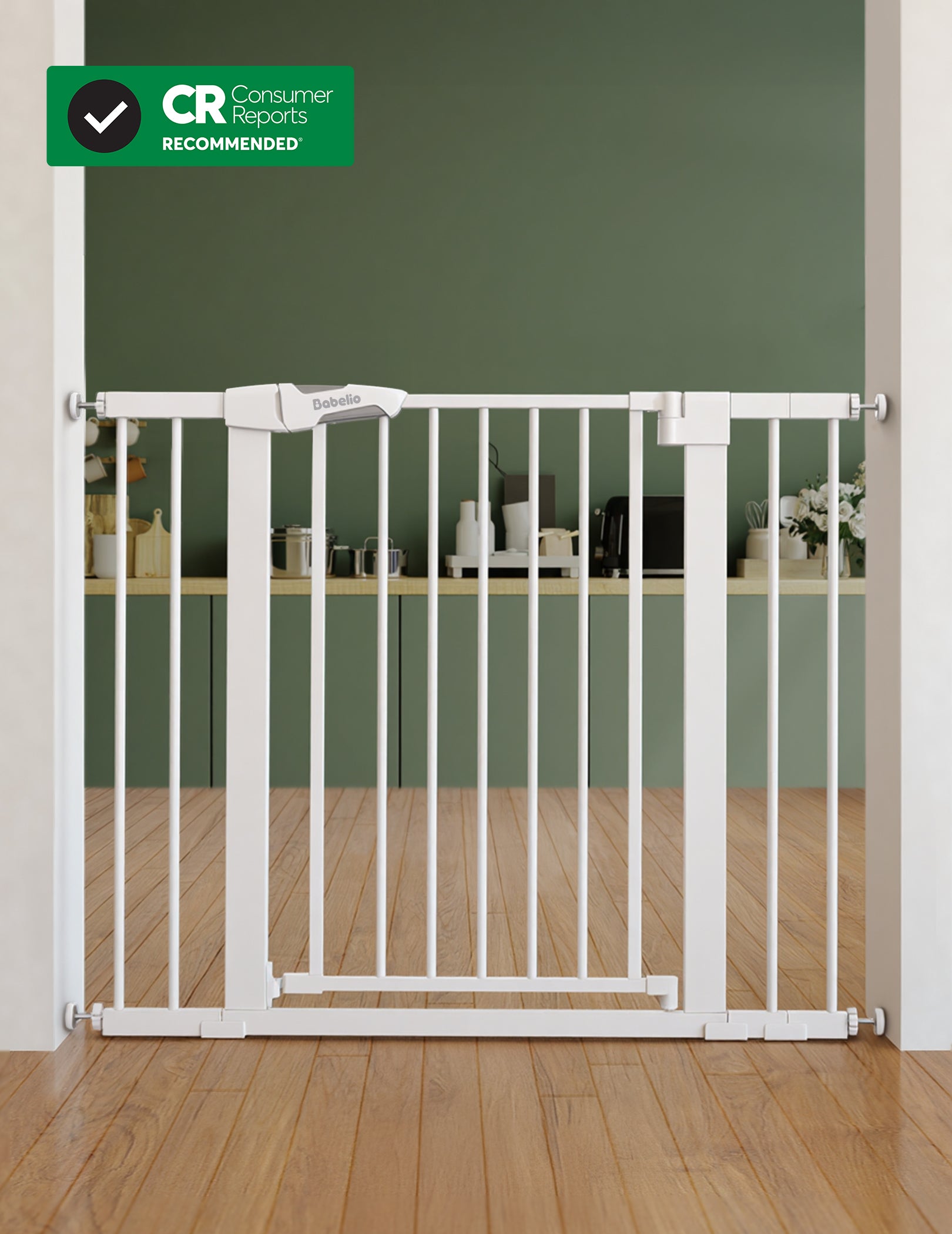 White baby gate on a wooden floor with a green wall in the background#Color_White