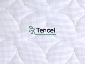 Close-up of Babelio crib mattress with white quilted Tencel cover, ideal for nursery