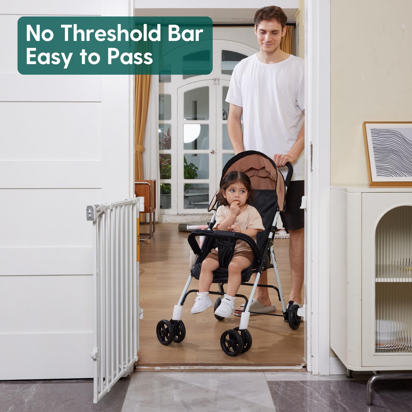 Man pushing a stroller through a baby gate no bottom bar for stairs, adjustable auto close design safe for children and pets, Babelio Boundless B17