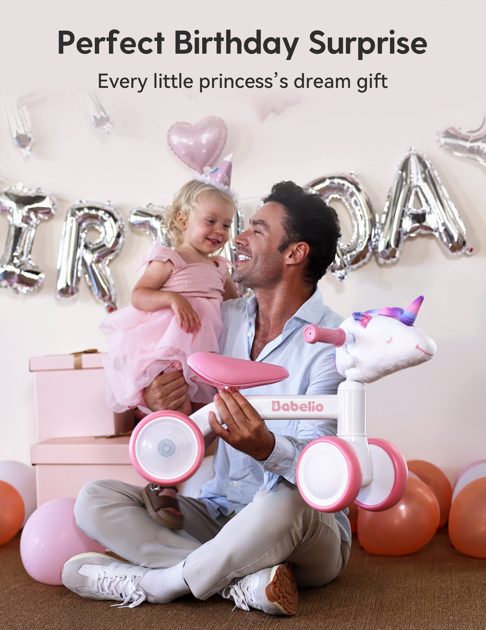 Father surprising his little daughter with a unicorn balance bike featuring a pink and white design and LED light-up wheels, the perfect birthday gift for 1–3 year old girls from the Magic Ride series by Babelio.