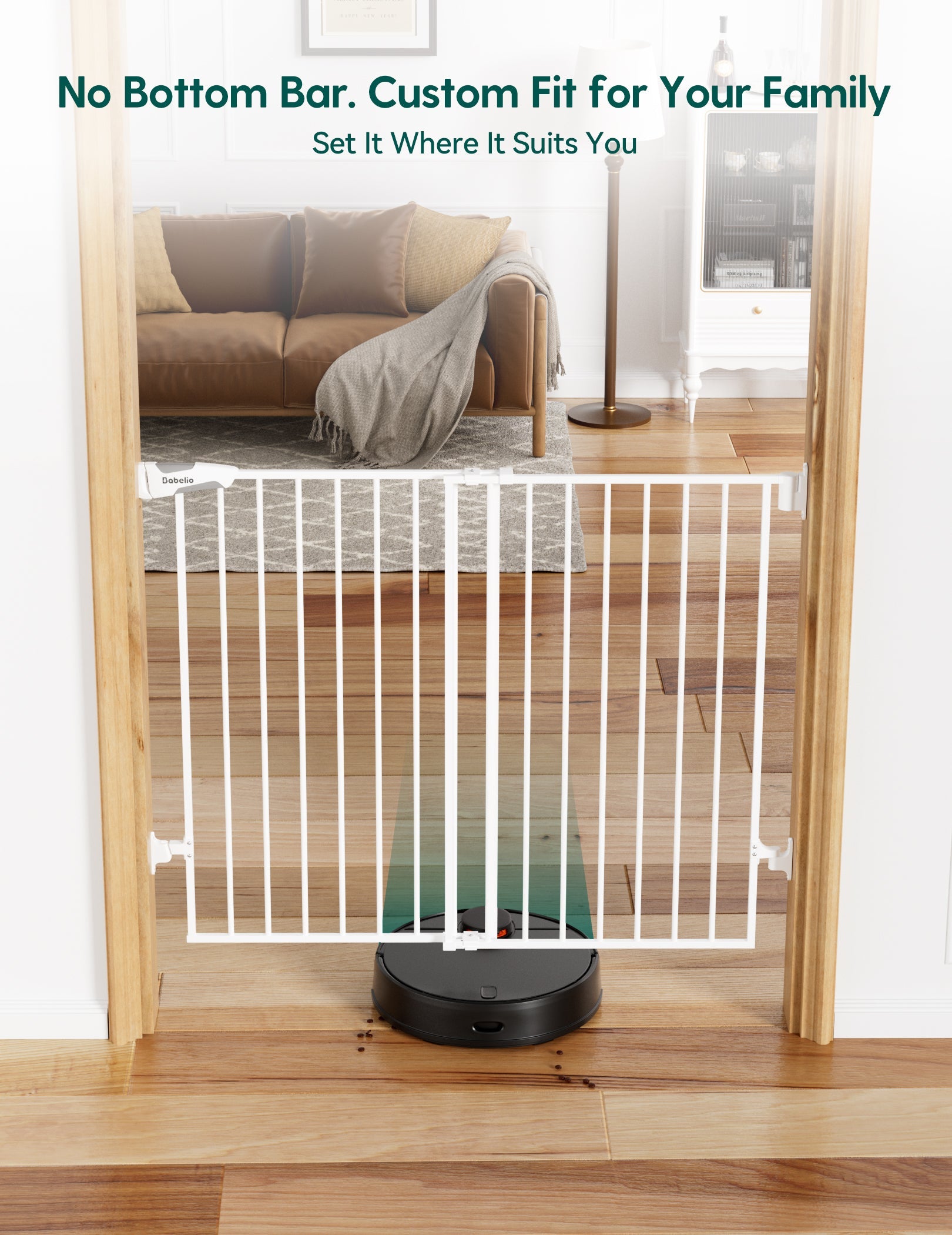 White baby gate with no bottom bar in a living room setting, featuring a couch and rug.