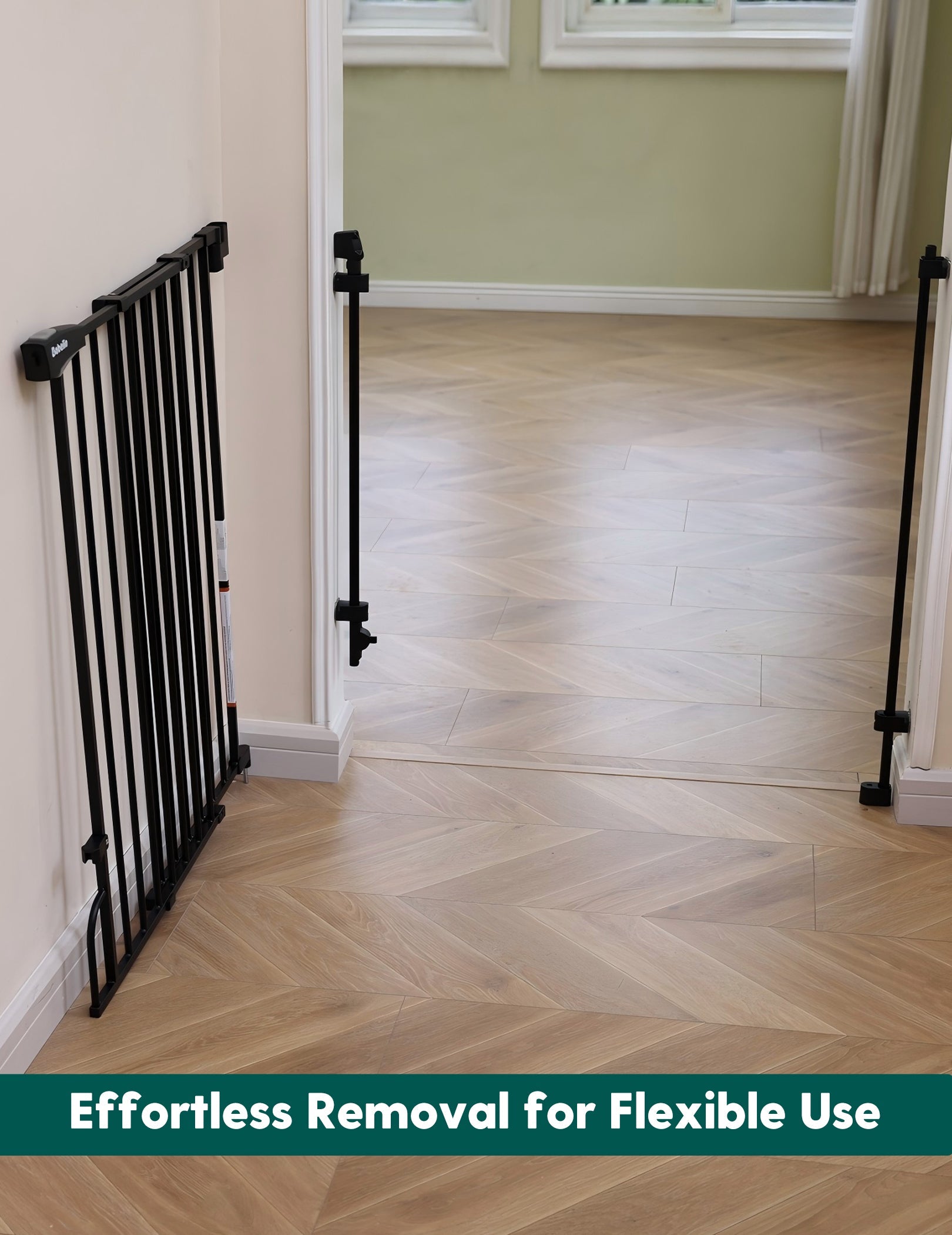 Babelio black baby safety gate removed from a doorway in a bright living room setting