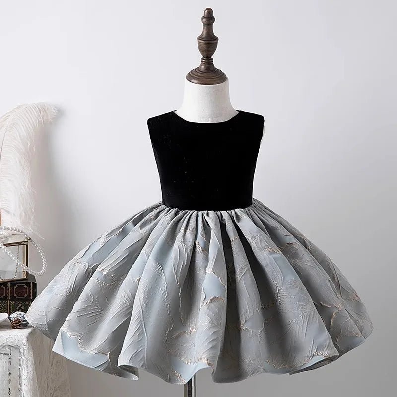 Babelio elegant girls' party dress with black velvet top and gray floral skirt on mannequin