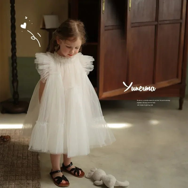 Young girl in a white dress 
