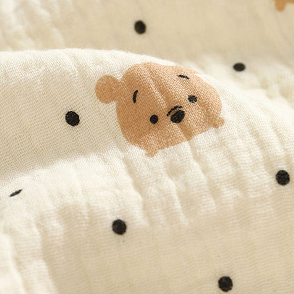 Babelio cotton muslin baby bib with bear face pattern and black dots on soft fabric