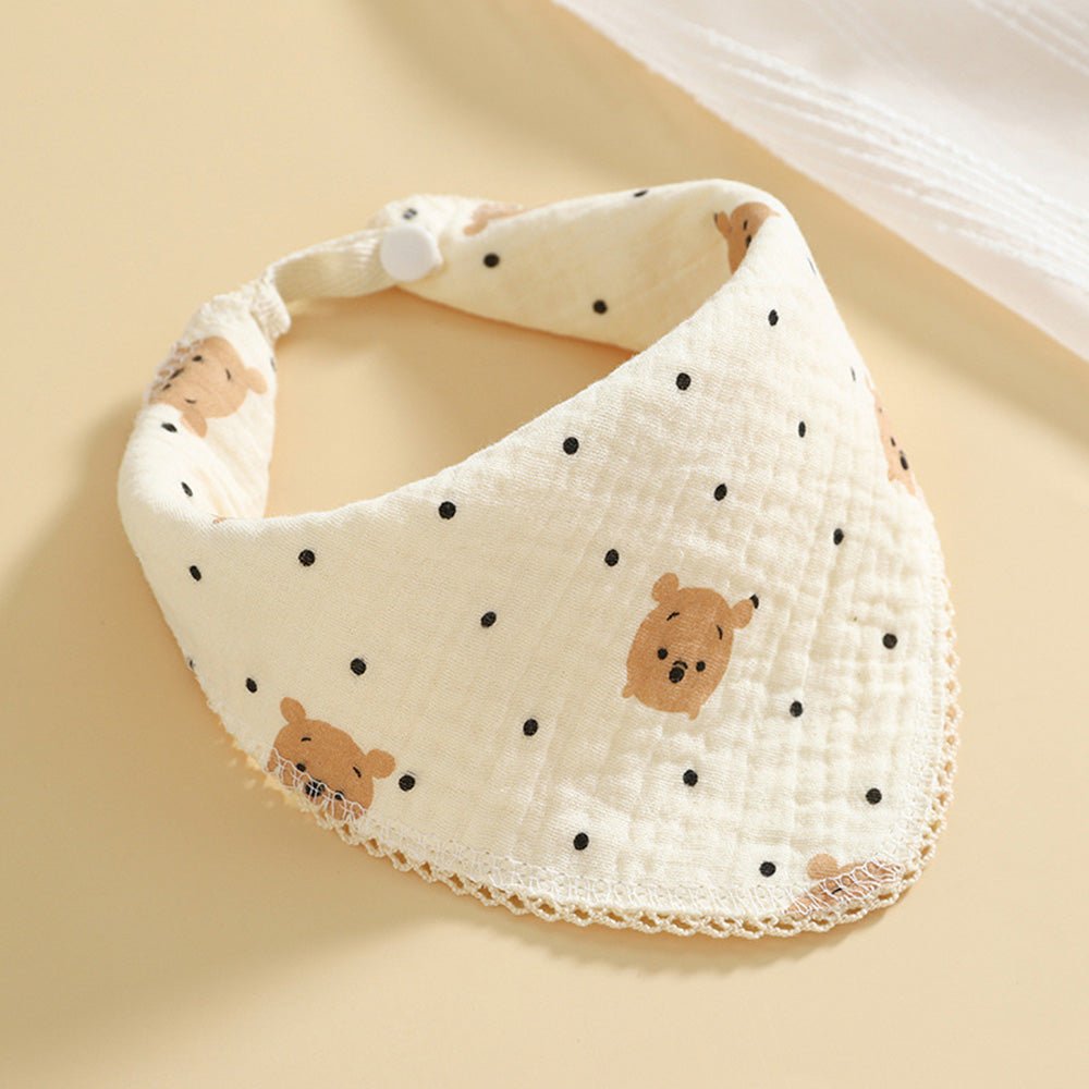 Babelio baby muslin bib with bear and polka dot print, cream color, on a neutral background