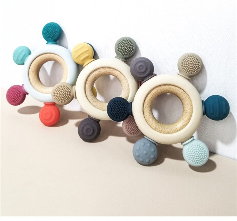 Babelio colorful baby teething toys with textured silicone, displayed on a neutral surface