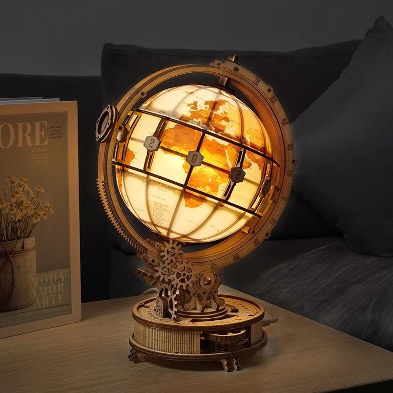 Babelio illuminated globe lamp with wooden gears on a living room table
