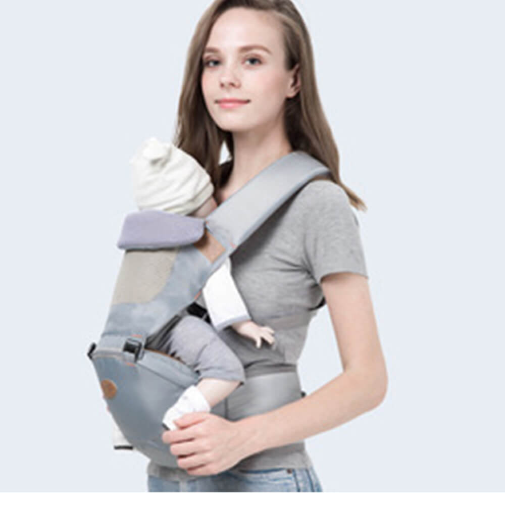 Babelio ergonomic baby carrier with hip seat and adjustable straps worn by mother