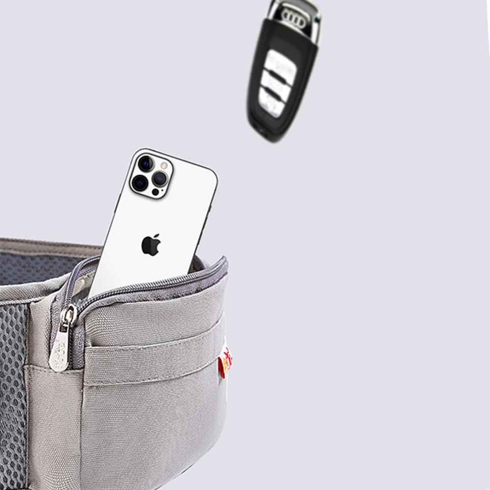 Babelio baby carrier hip seat with zippered pocket storing a phone and car key