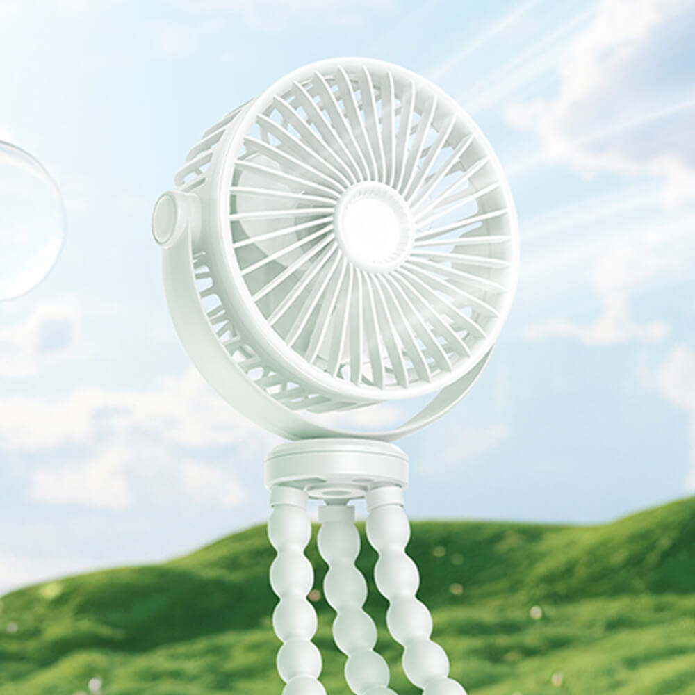 Babelio portable mini USB fan with flexible tripod legs outdoors against a blue sky