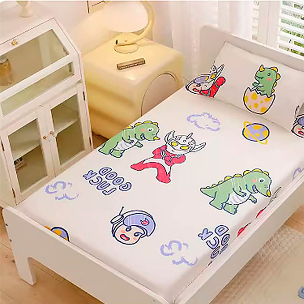 Babelio crib mattress in nursery with cartoon dinosaur and hero print bedding