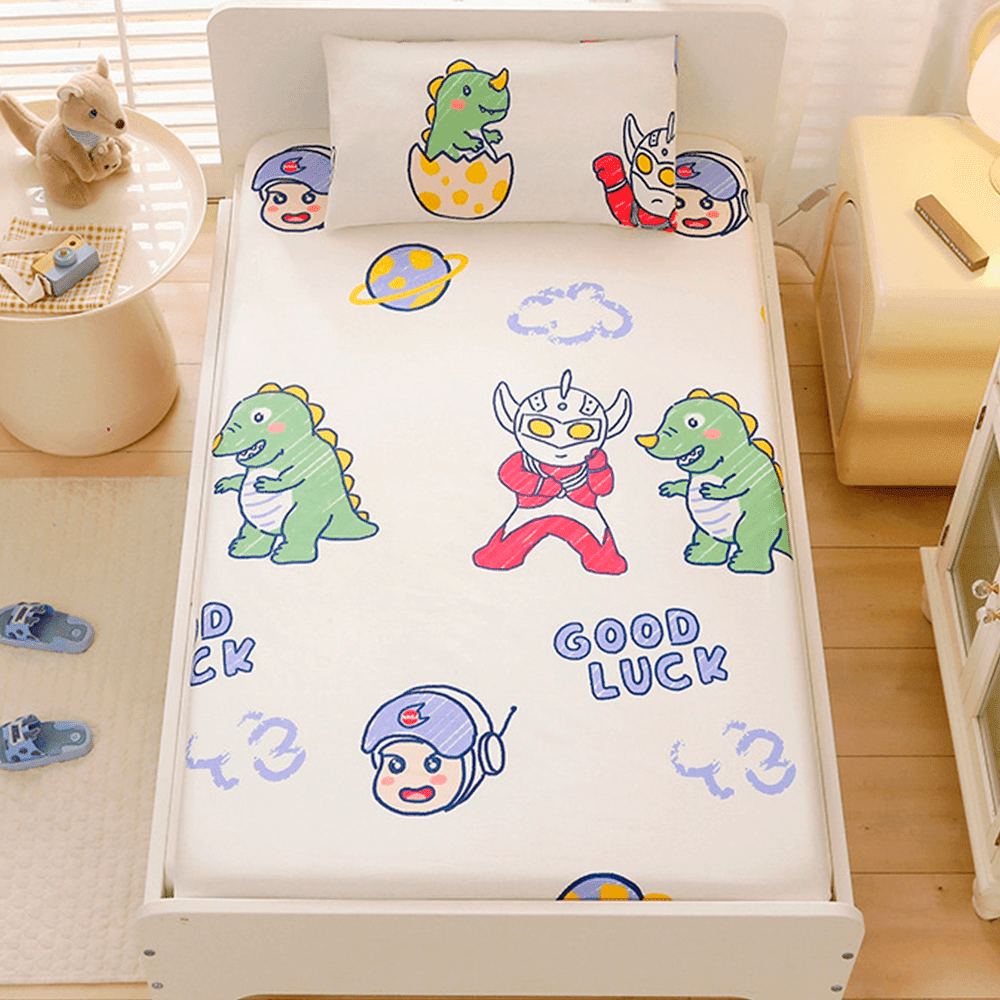Babelio crib mattress in nursery with playful cartoon dinosaur and hero patterns