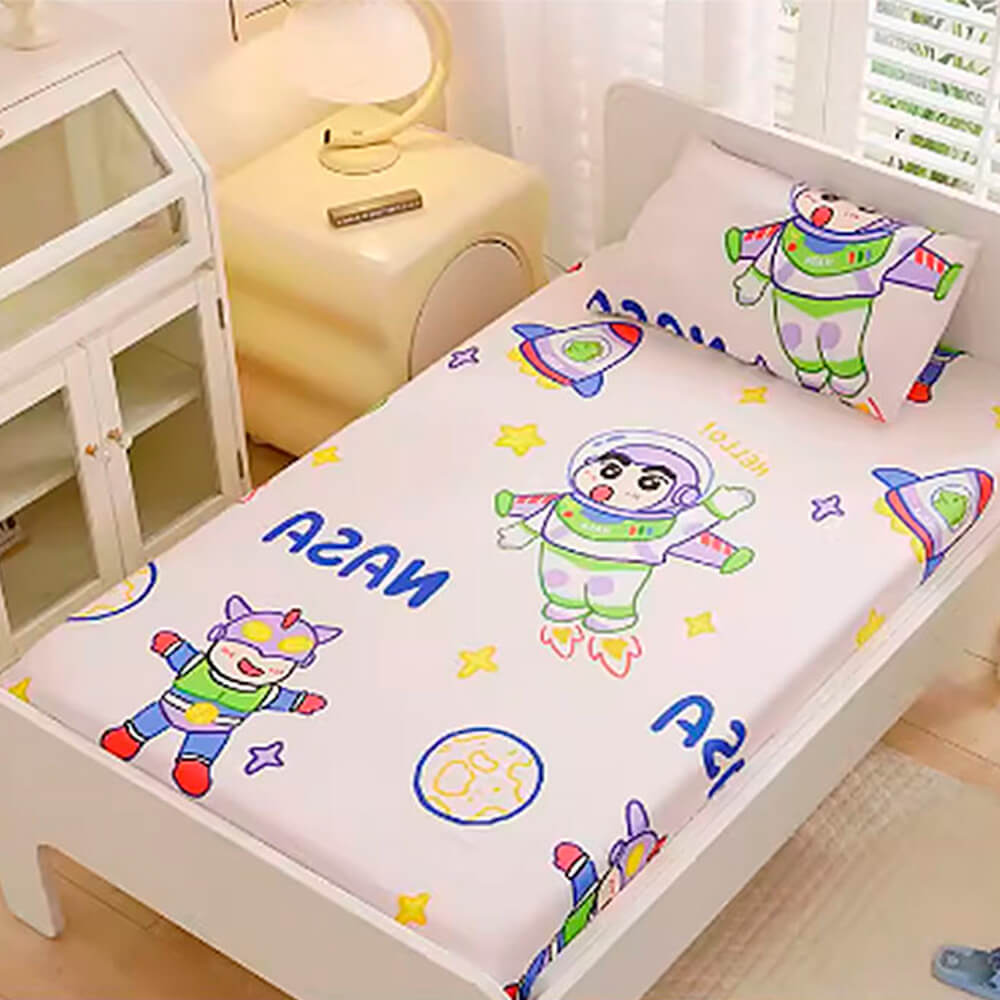 Babelio crib mattress with playful cartoon astronaut pattern in a bright nursery room