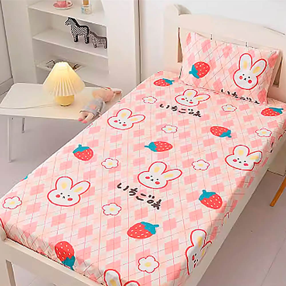 Babelio crib mattress with pink cartoon bunny and strawberry pattern in a nursery