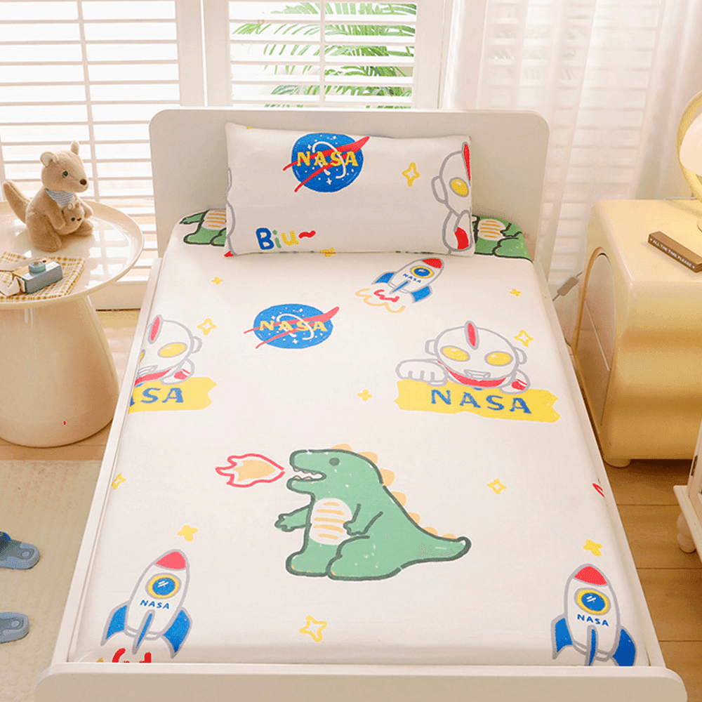 Babelio crib mattress in nursery with playful cartoon dinosaur and space pattern