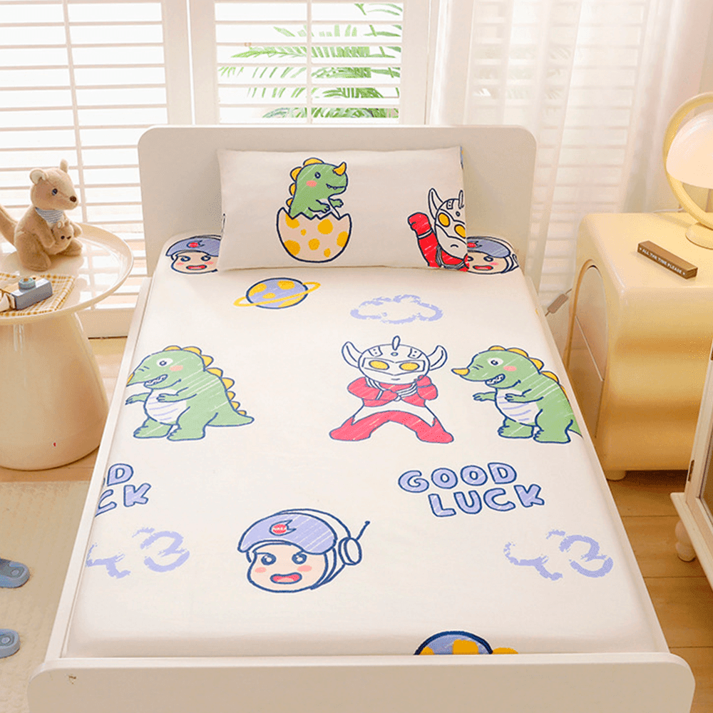 Babelio crib mattress with playful cartoon pattern in a bright nursery setting