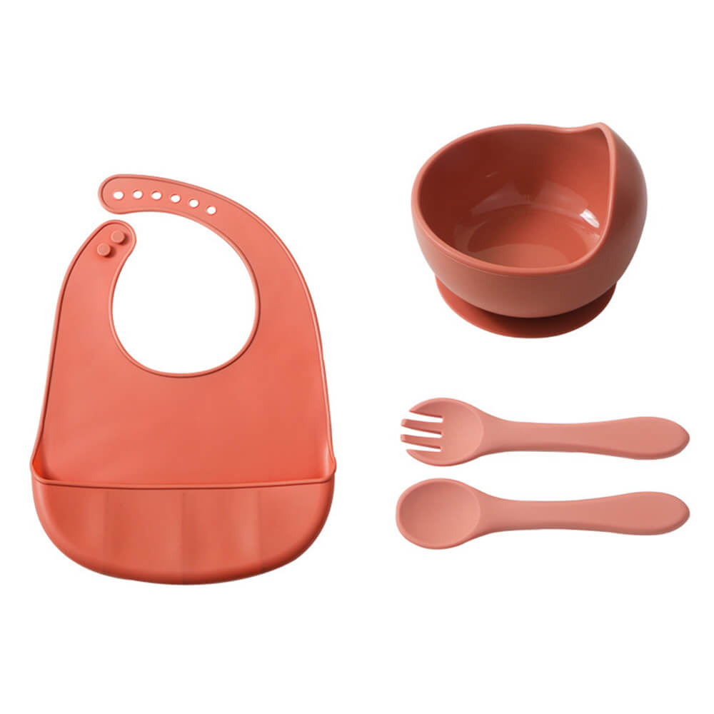 Babelio silicone baby feeding set with bib, bowl, fork, and spoon in coral color