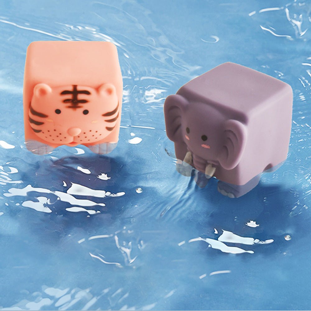 Babelio tiger and elephant baby bath toys floating in water, playful nursery accessories