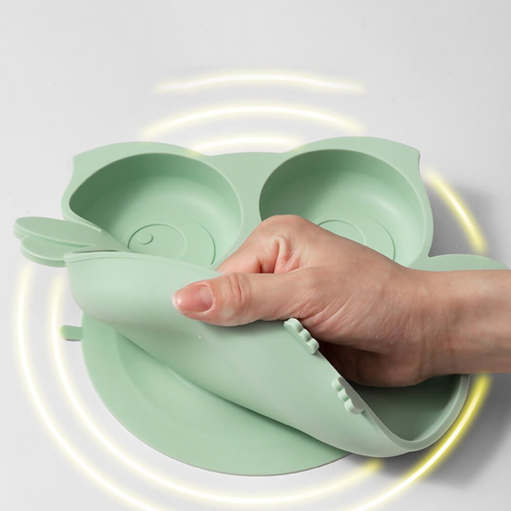 Babelio silicone owl toddler plate, anti-fall divided feeding dish shown flexible in hand