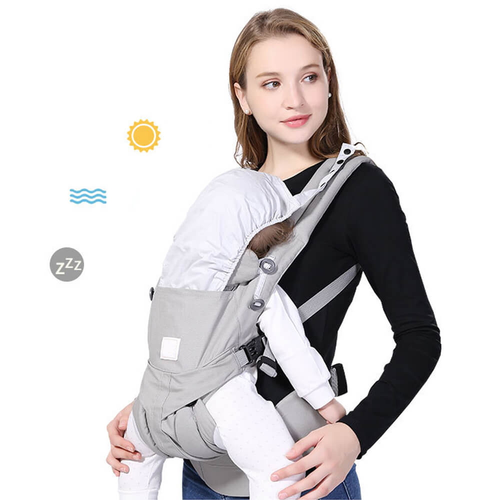 Babelio ergonomic baby carrier sling with infant, worn by woman, white background