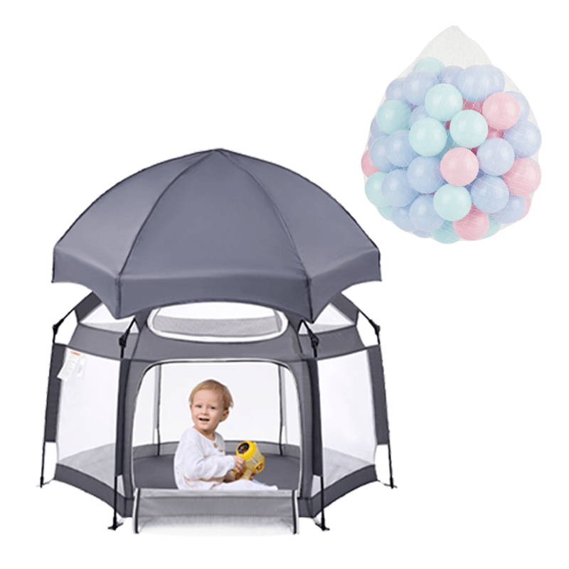 Babelio portable playpen with canopy and pastel balls, baby inside, indoor play area.