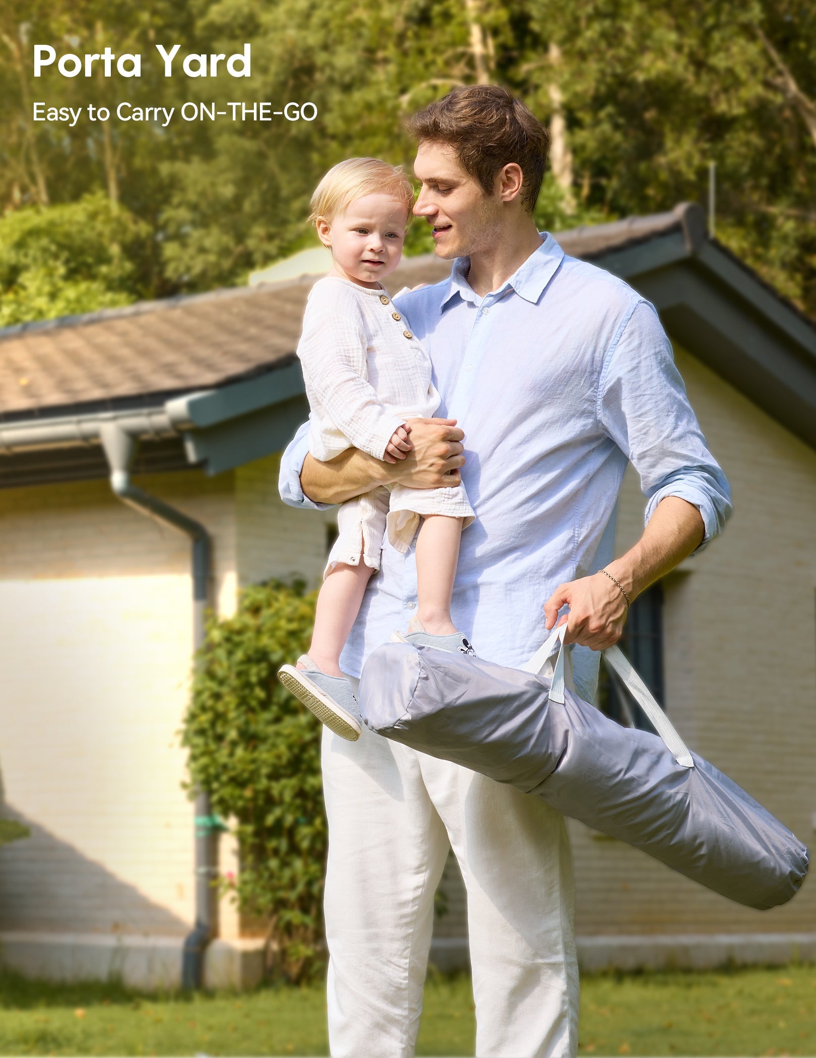 Father carrying toddler and Babelio baby playpen bag outdoors, easy-to-carry design.