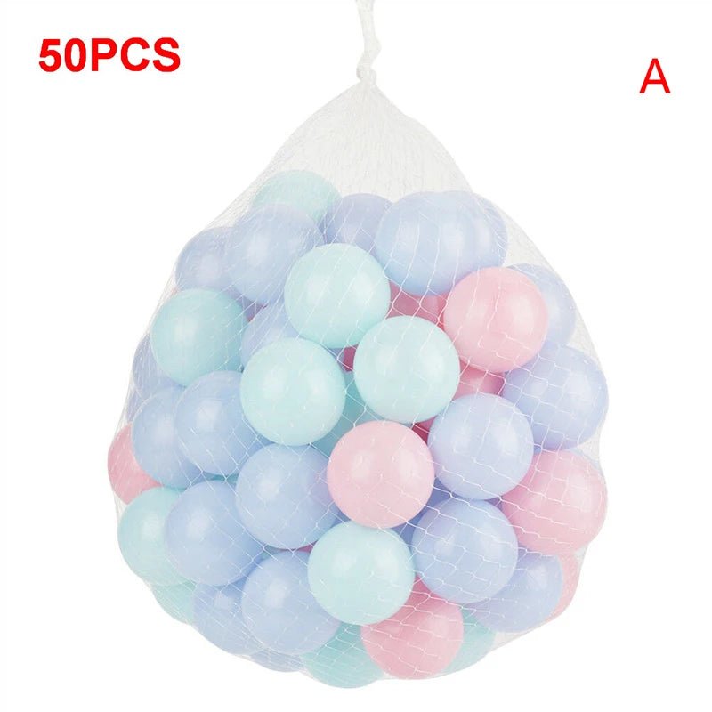 Babelio pastel play balls set of 50 in mesh bag, ideal for baby nursery or playroom.