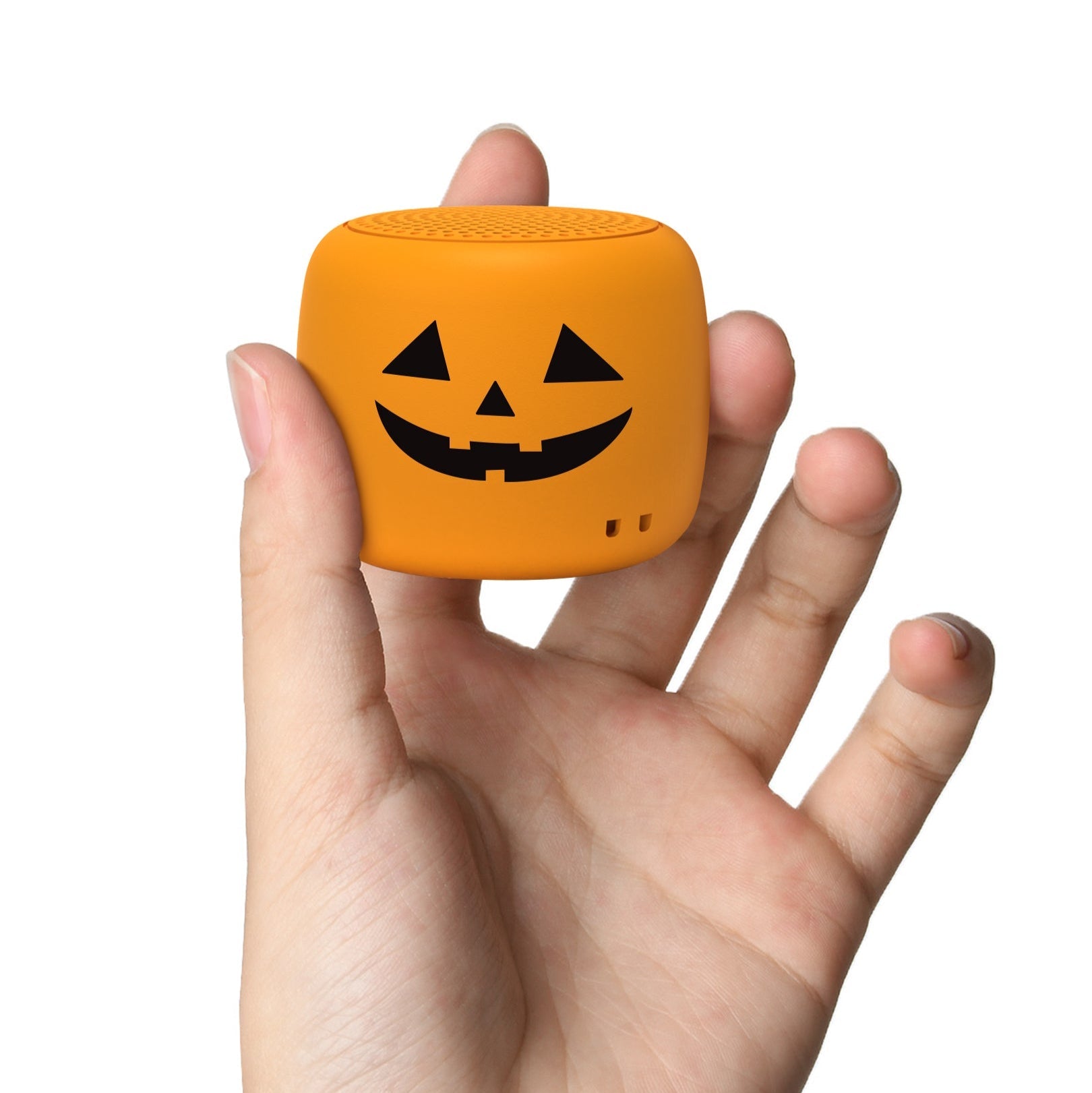 Babelio pumpkin-themed white noise machine held in hand, ideal for baby nursery use