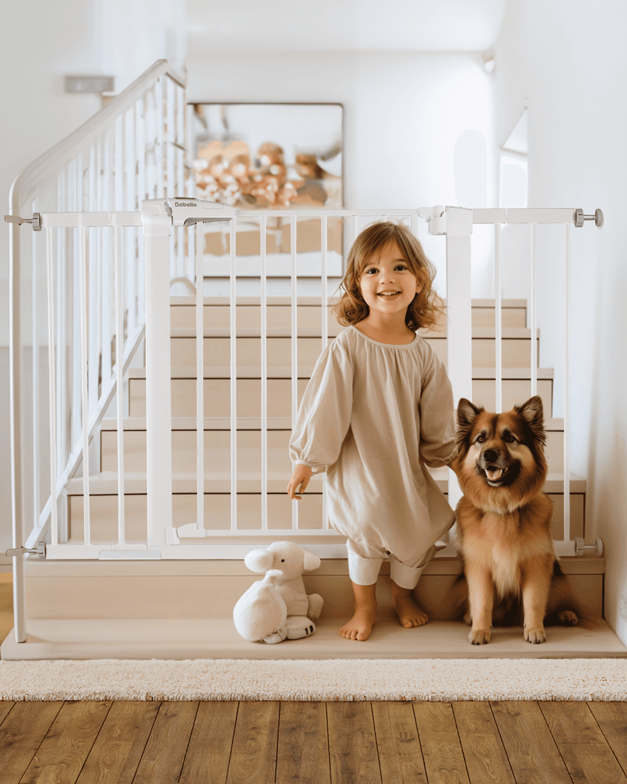 Babelio baby safety gate installed on stairs with child and dog in a modern hallway setting#Color_White